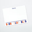 A personalized flat notecard with 'Blob Blob Blob' printed in orange and blue along the bottom edge, with the name 'Harris' printed at the top in blue.