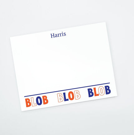 A personalized flat notecard with 'Blob Blob Blob' printed in orange and blue along the bottom edge, with the name 'Harris' printed at the top in blue.