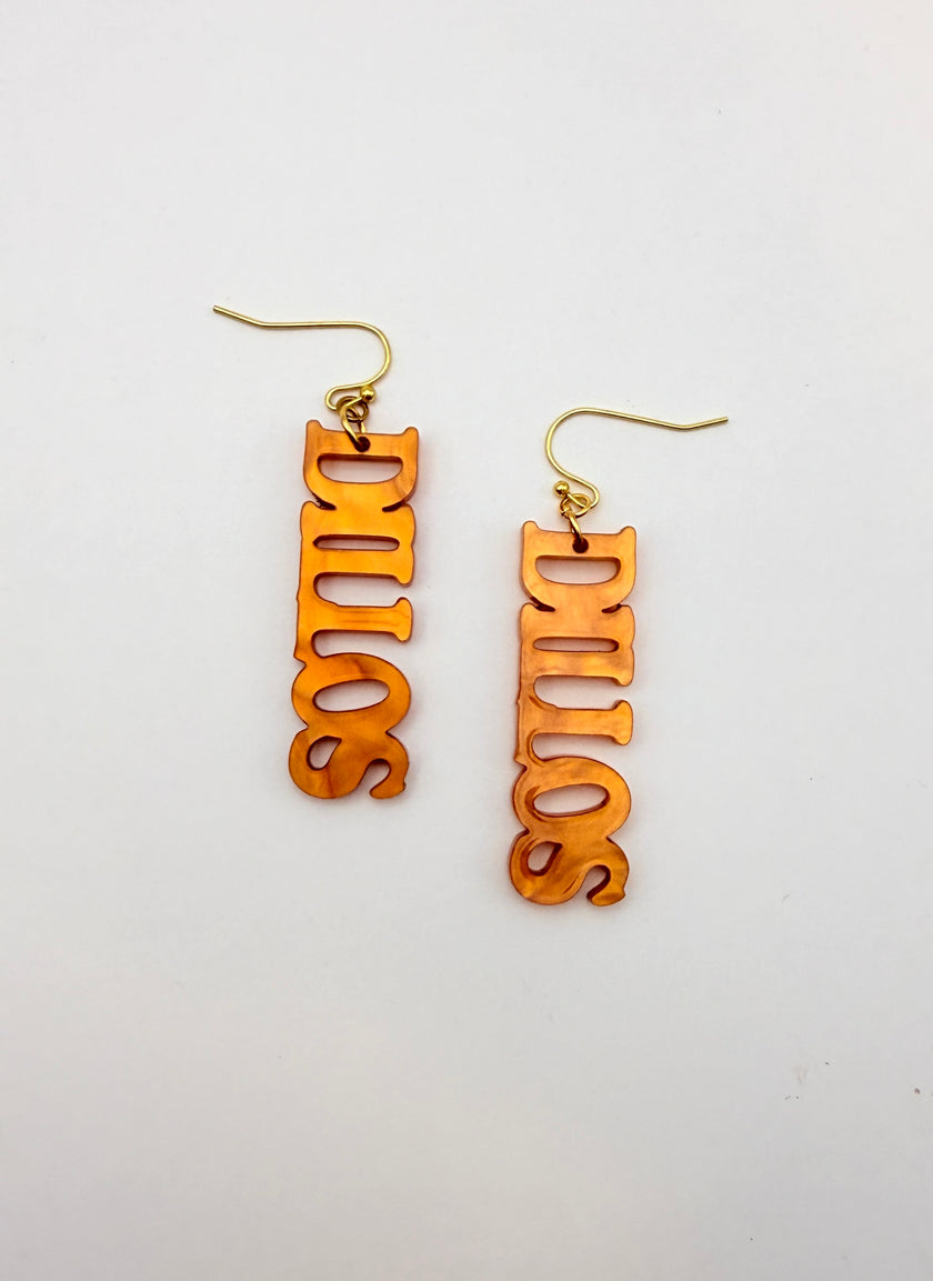 Gold 'DILLOS' earrings on a white background