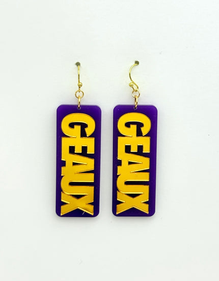 Purple earrings with 'GEAUX' text on a white background