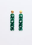 Green earrings with gold tops on a white background