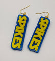 Blue and yellow 'Spikes' earrings on a white background