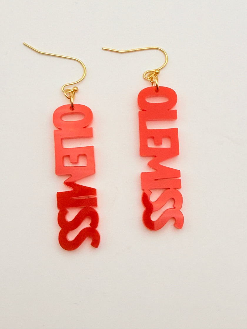 Red 'OLE MISS' earrings with gold hooks on a light gray background