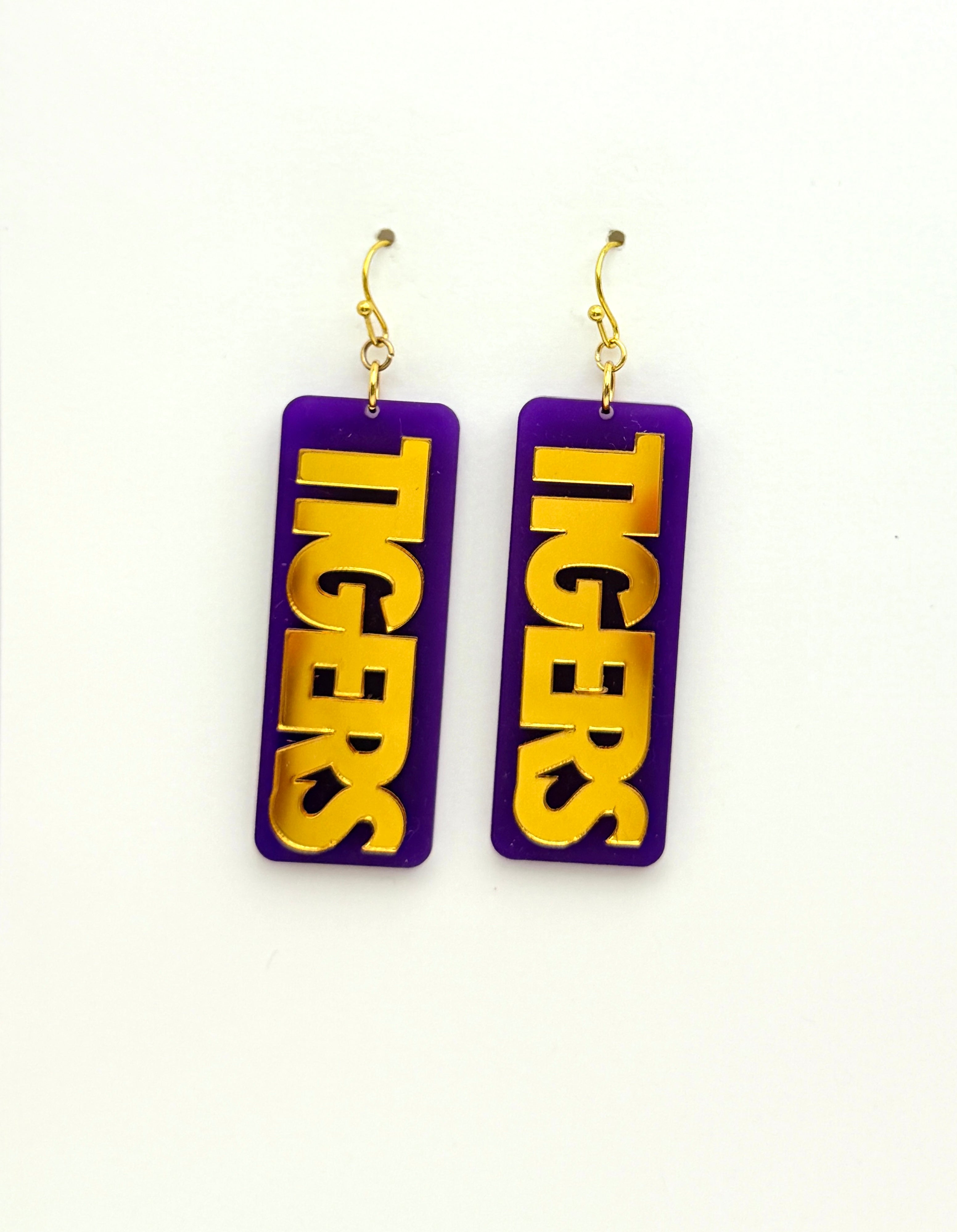 Purple and gold 'Tigers' earrings on a white background
