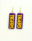 Purple and gold 'Tigers' earrings on a white background