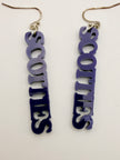 Pair of earrings with 'SCOTTIES' text on a white background