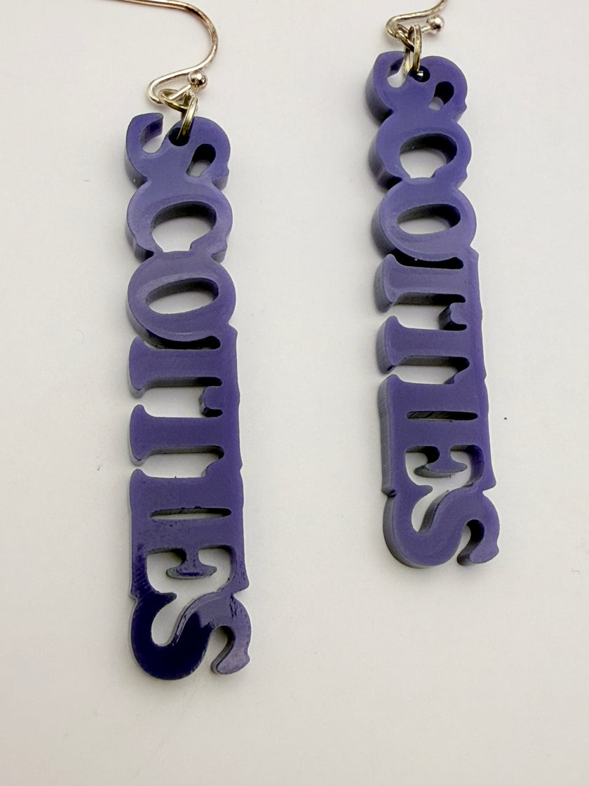 Purple 'SCOTTIES' earrings on a white background