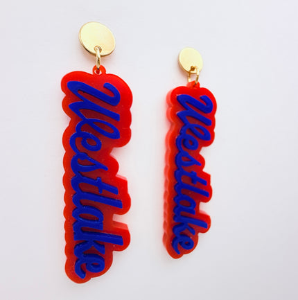 Red and blue 'Westlake' earrings on a white background