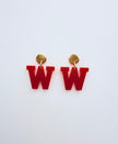 Red letter 'W' earrings with gold studs on a white background